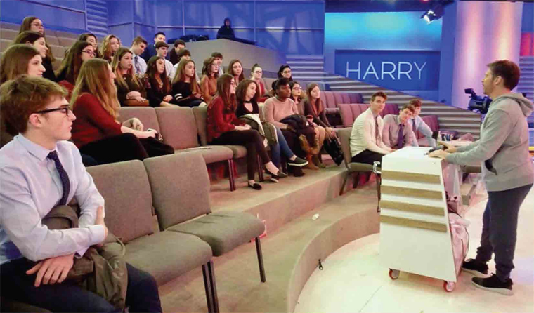 Monsignor Farrell and St. Joseph Hill High School students listen to Harry
Connick Jr. on the set of