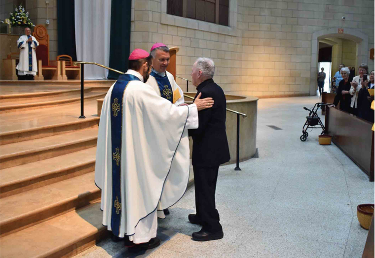 Brother Patrick McCormack, CFC with Bishop Daniel E. Flores, Bishop of Brownsville, TX (on his left) and
Bishop Mario Alberto Aviles, C.O, auxiliary Bishop of Brownsville (on his right).