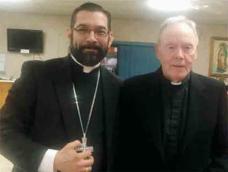 Bishop Flores (left) and Brother McCormack.