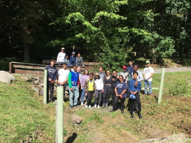Iona students pose for a picture during a recent Bronx River cleanup project with the Westchester Parks Foundation.