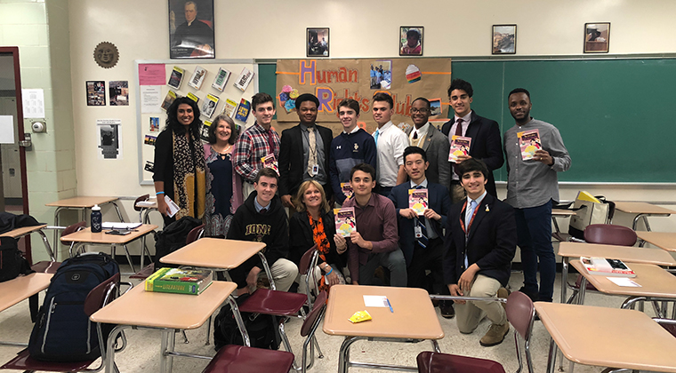 Student members of Iona Prep's Human Rights
Club pose with guest speaker Sangita Bajulaiye, a
Human Rights attorney and Ph.D candidate from
the Netherlands (top left). Also pictured are
Sangita's husband Omololu (Iona Prep class of
2007, top right), and Human Rights Club
moderators Patricia Gray (second from left, top)
and Christina Chana (second from left, below).