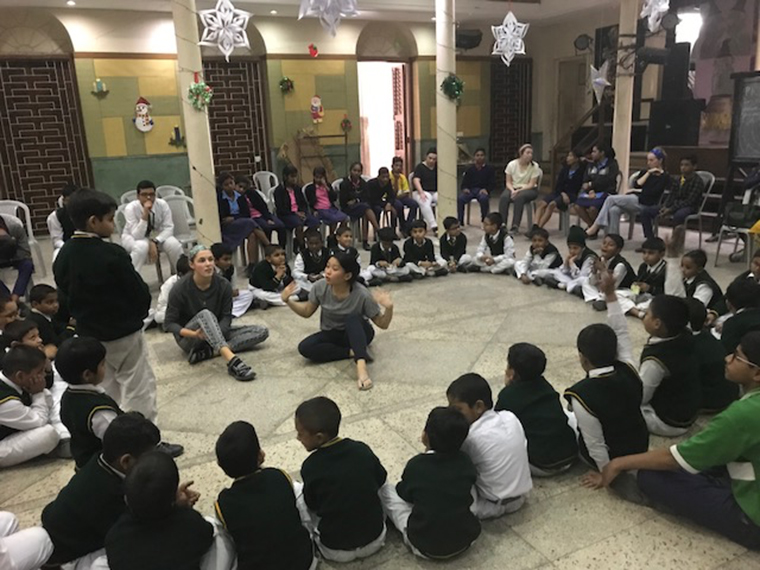 Iona College
students speak with students at a
Christian Brother school in Kolkata.