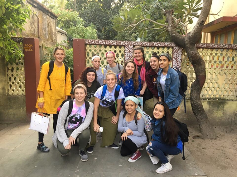 Students in Kolkata pose with an Iona
College visitor; the Iona College India
immersion team.