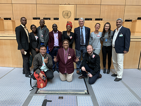 Mia posing with other ERCB Network members inside the UN after the Universal Periodic Review.