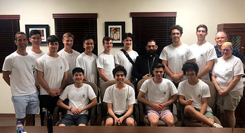 Students from Vancouver College pose
with Brownsville Bishop Daniel Flores (right-center) during
the third week of the 2019 Brownsville Immersion Program.
