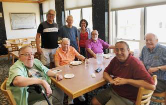 L-R: Brothers Steve Hale, Sean Whitty, Jim Fagan, Bill Stevens,
Ms. Niahm Brennan, Brothers Ben McDonough, Kevin Griffith, and
Michael Colasuonno.